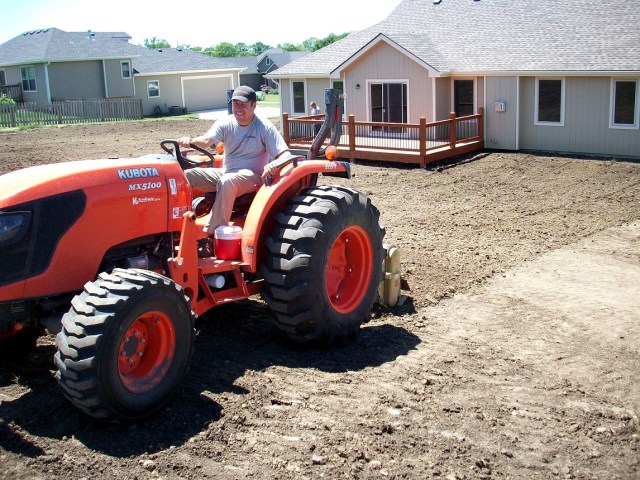 Fearless_leader_joe_tilling_kansas_soil Professional Soil/ Clay cultivation and preparation for Seeding in Manhattan, Kansas