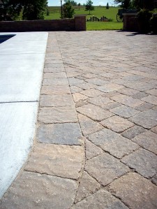 detail of bergerac pavers cuts next to pool near manhattan kansas